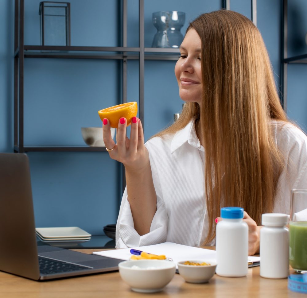 Specialist in dietetics advises an online client and makes an appointment for taking vitamins.